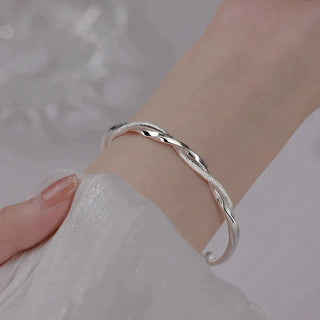 Sterling Silver Twisted Bracelet with Adjustable Geometric Design | Silvella