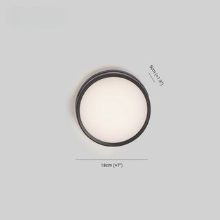 Round LED Motion Sensor Outdoor Wall Light | Lumevora